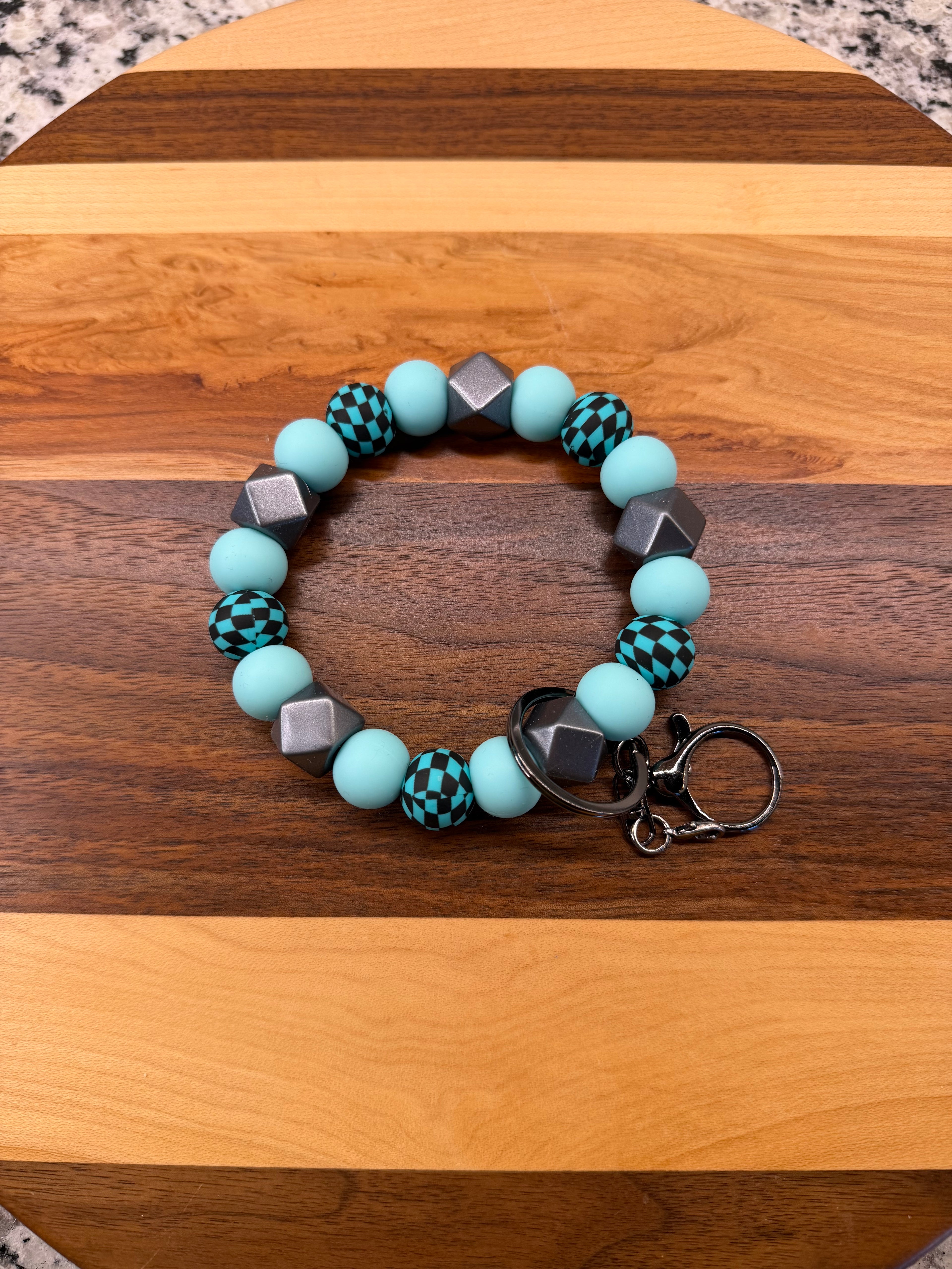 RTS - Teal Rush Check Wristlet