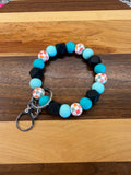 RTS - Spring Teal Checker Wristlet