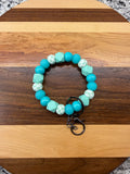 RTS - Teal Check GLOW Wristlet