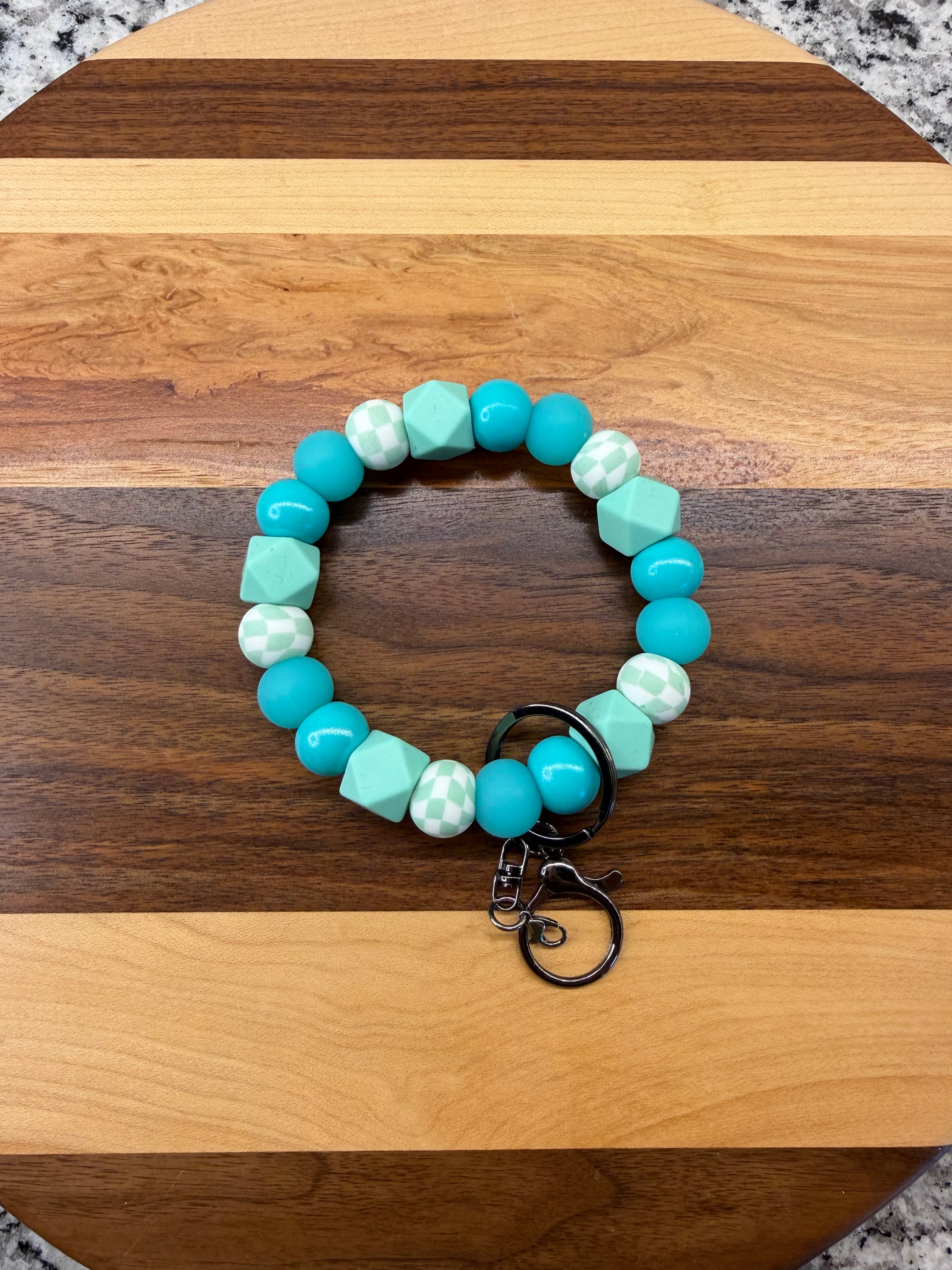 RTS - Teal Check GLOW Wristlet